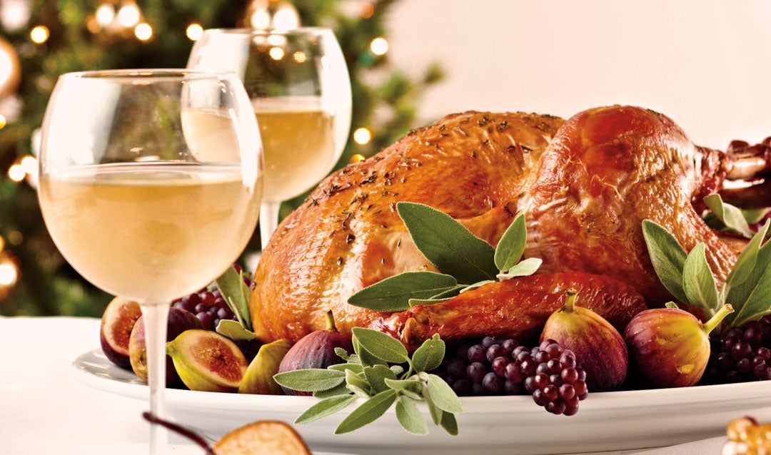 Roast turkey paired with glasses of Biltmore white wine
