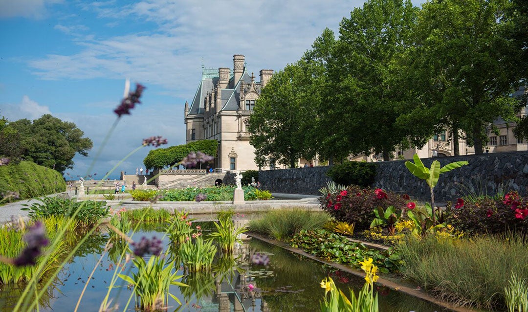 Beautiful photo of Biltmore's Italian Garden with house reflecting off water