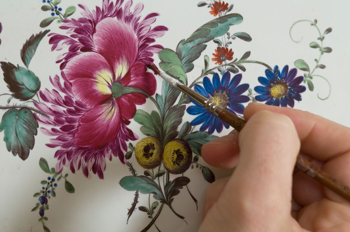 Detailed view of the handpainted flowers on the over-mantel
