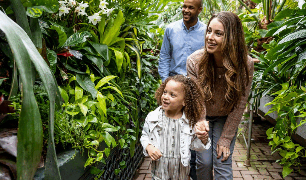 Parents and child in the Conservatory at Biltmore