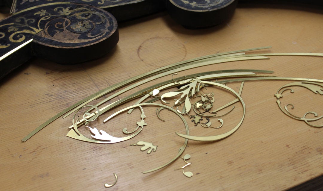 Pieces of brass marquetry for the desk