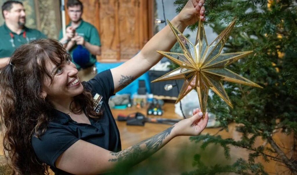 Team members decorate for Christmas at Biltmore.