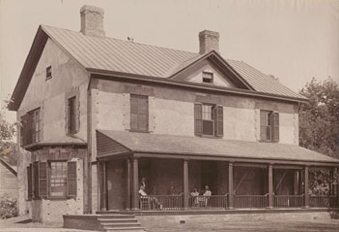 Archival image of the Brick Farm House, circa 1889