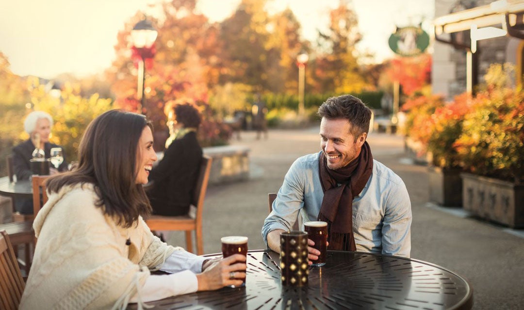 Couple enjoying fall at Antler Hill Village