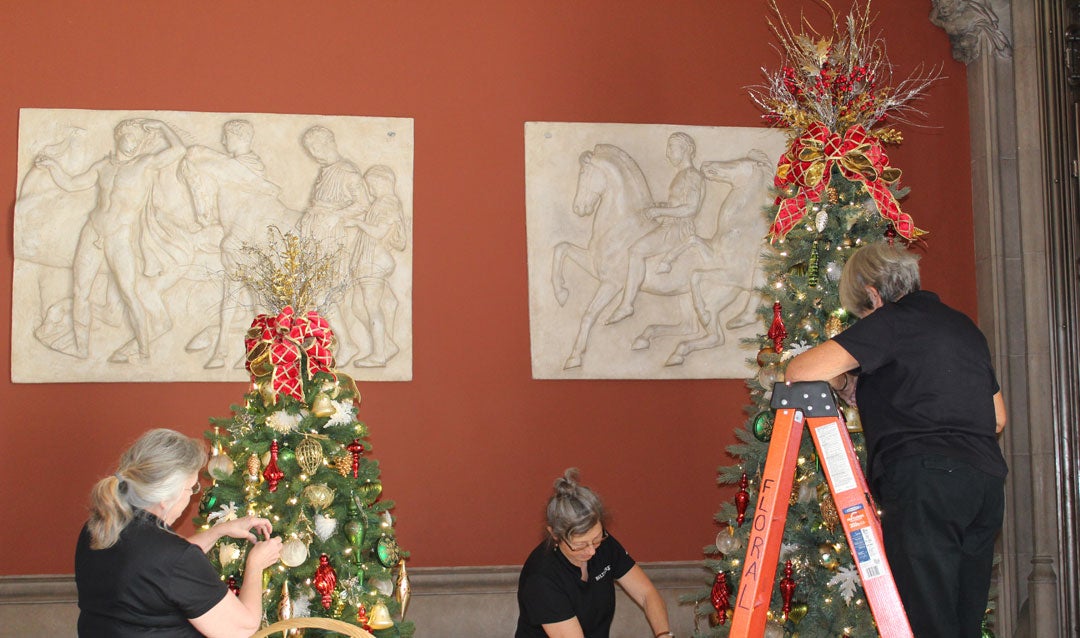 Decorating Christmas trees in Biltmore House