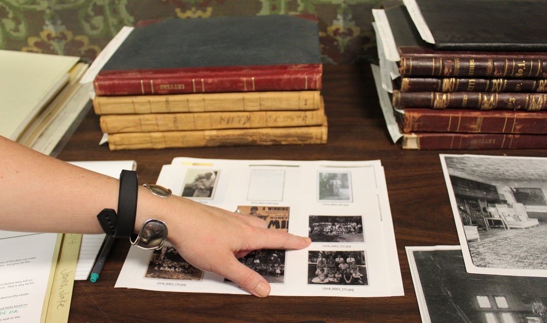 Curator's pointing at documents