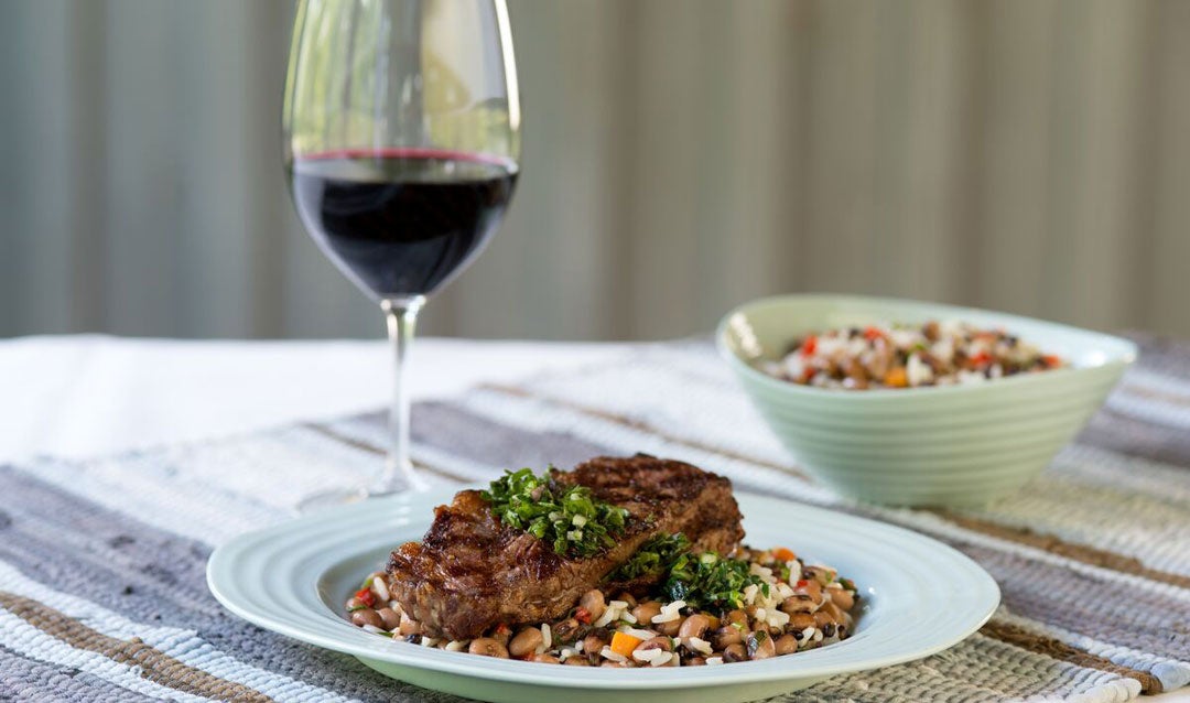 Steak with a glass of red wine