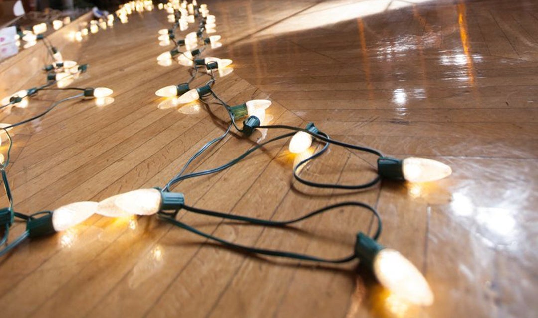 Christmas lights lay across the floor