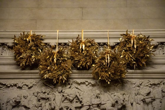 Golden wreaths above the Banquet Hall fireplace