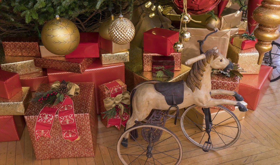 Celebrate Biltmore's Tree-Raising Tradition Virtually with lively details like these pretty packages and toys