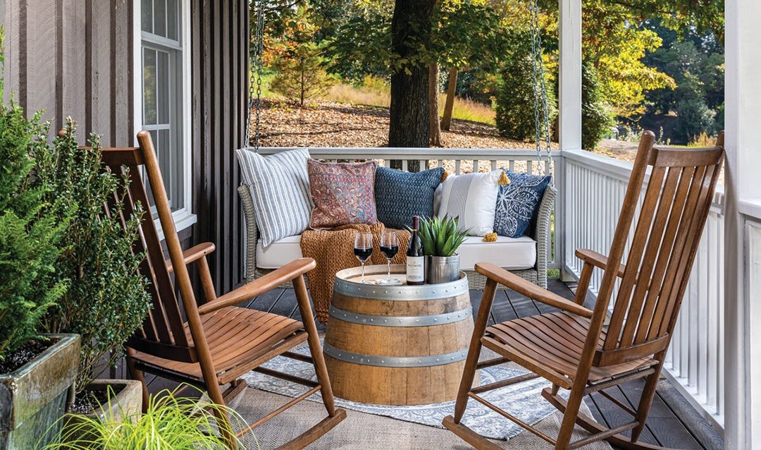 Charming front porch with swing and rocking chairs