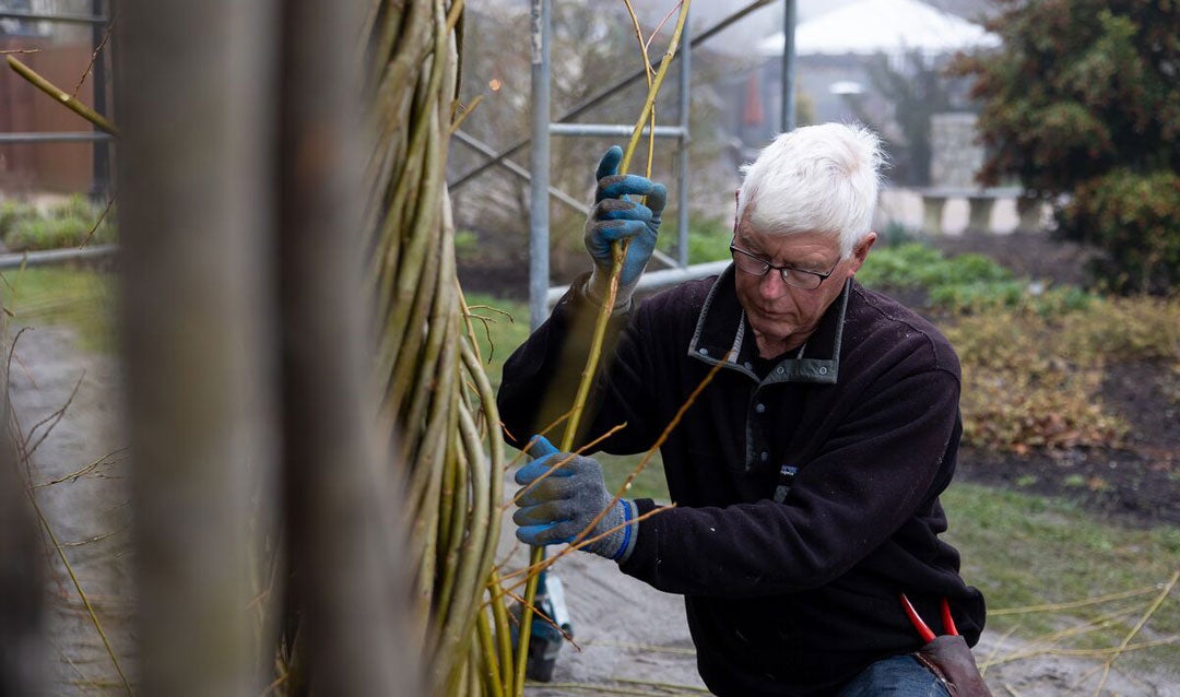 Patrick Dougherty with his Stickwork creation for Biltmore