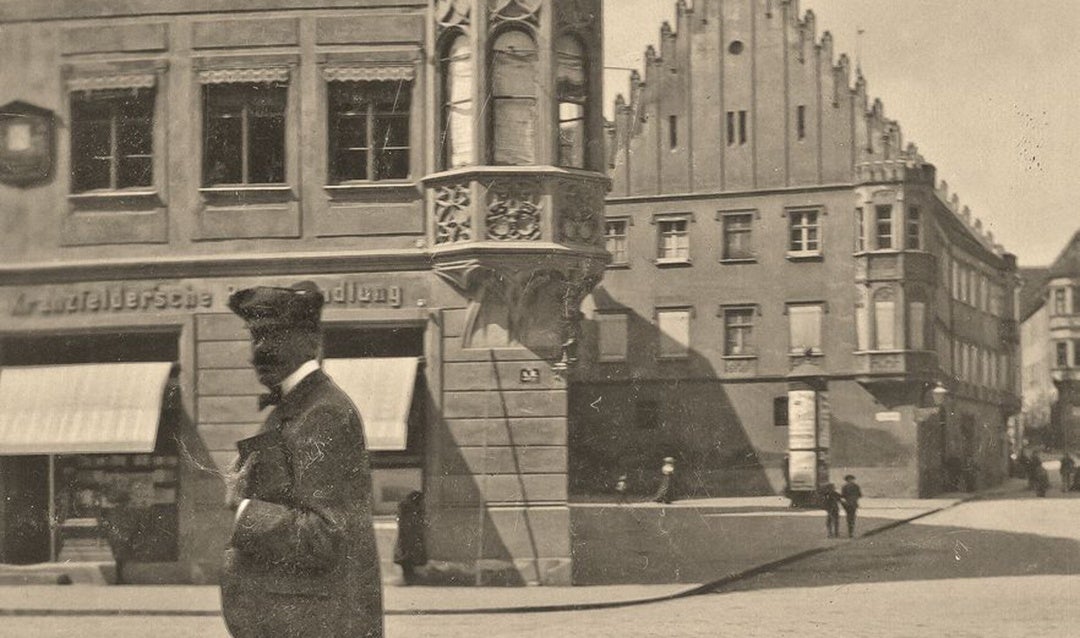 George Vanderbilt on the streets of Germany with a book in hand, ca. 1903