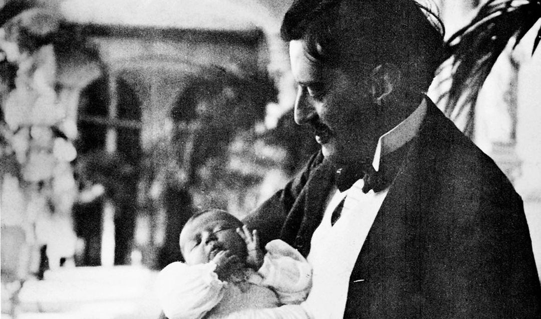 George Vanderbilt with newborn daughter Cornelia on the Loggia of Biltmore House, September 30, 1900