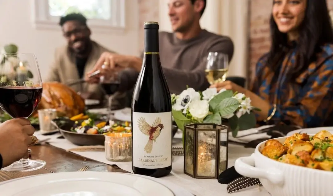 People enjoying perfect pairings of Biltmore wine and food.