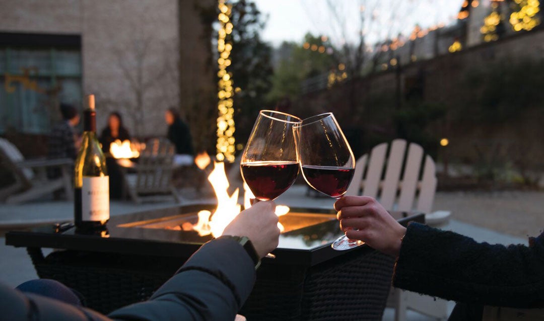 Couple toasting a small moments with Biltmore wine