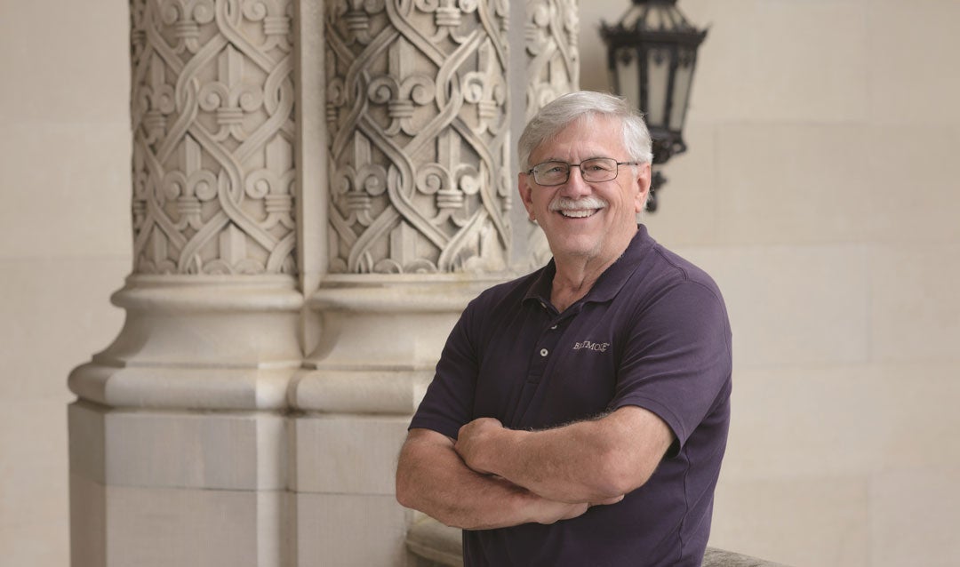 Biltmore employee by Biltmore House column