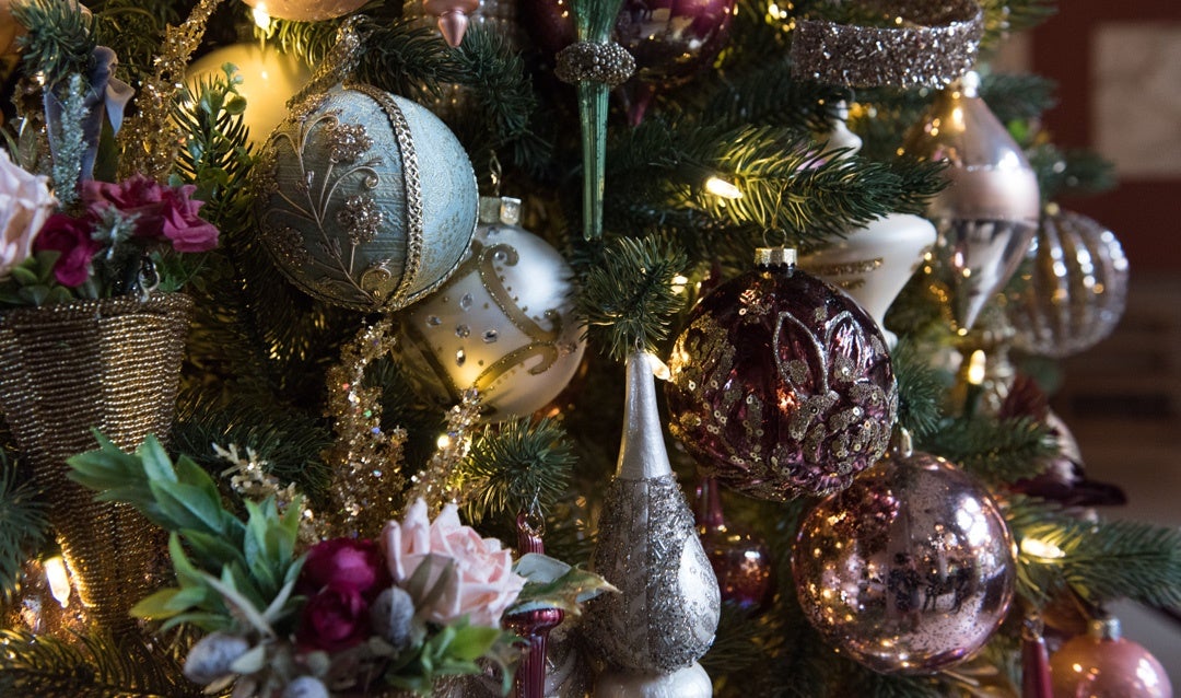 The Christmas tree in the Salon boasts beautiful rose gold and slate blue ornaments.