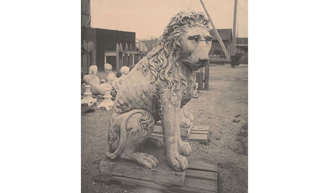 Archival photo of a marble lion statue at Biltmore