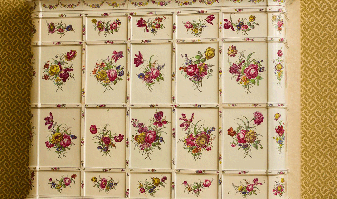 Handpainted ceramic tiles in the Tyrolean Chimney Room.