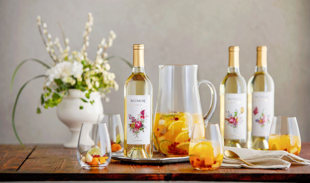 Masterpiece Collection White Wine bottles with a pitcher of sangria