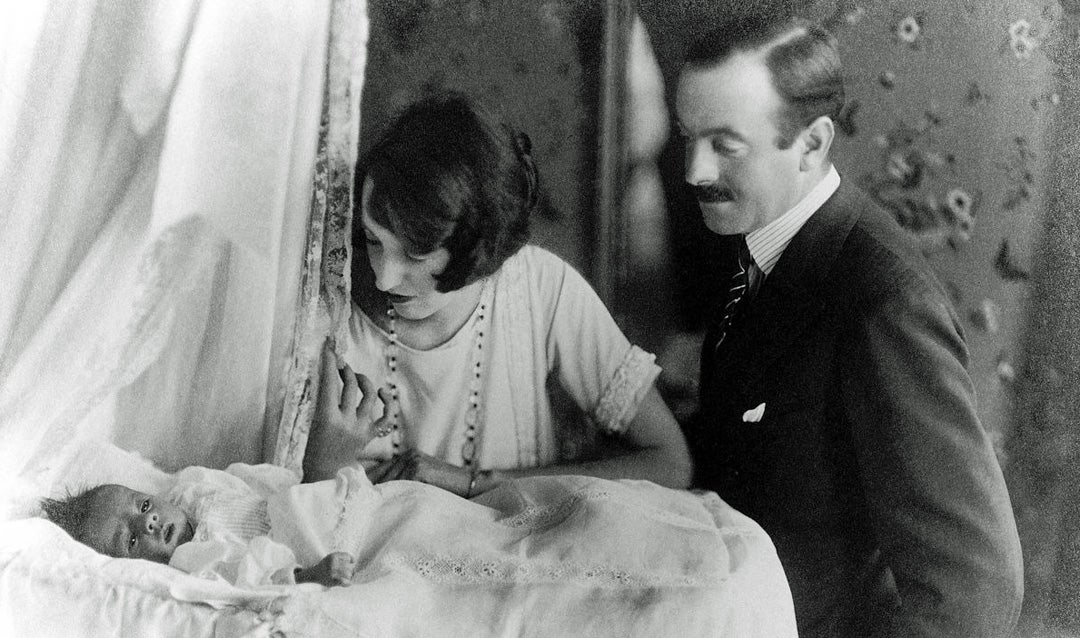 Cornelia Vanderbilt Cecil and her husband John Francis Amherst Cecil with their oldest son George Henry Vanderbilt Cecil as an infant, ca. 1925.