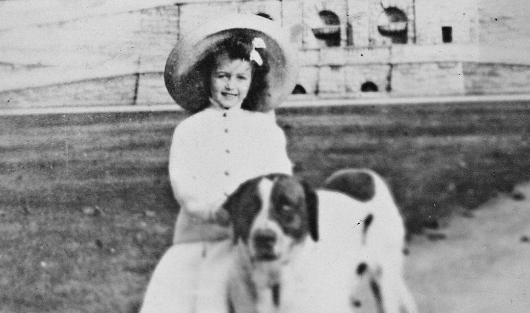 Cornelia Vanderbilt with a St. Bernard on the Front Lawn of Biltmore House, ca. 1903.