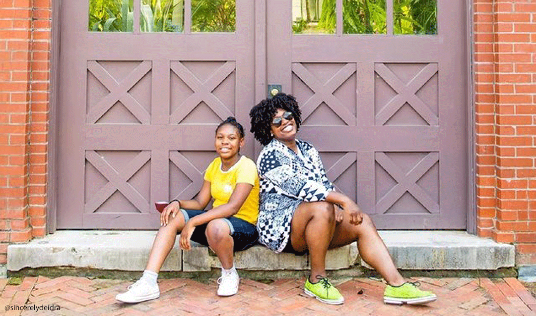 Mother and daughter enjoy a friends' getaway moment in front of the Conservatory at Biltmore