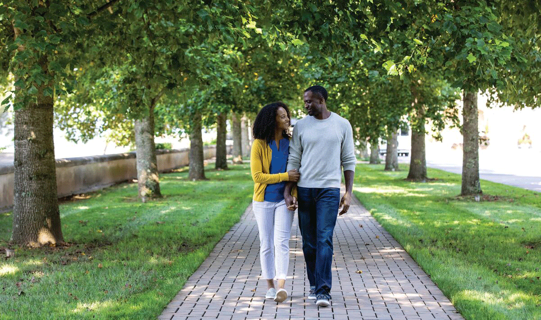 Couple holds hands at Biltmore