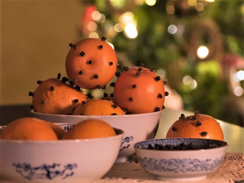 Christmas “pomanders” are a classic Christmas decoration made of clove-studded oranges.