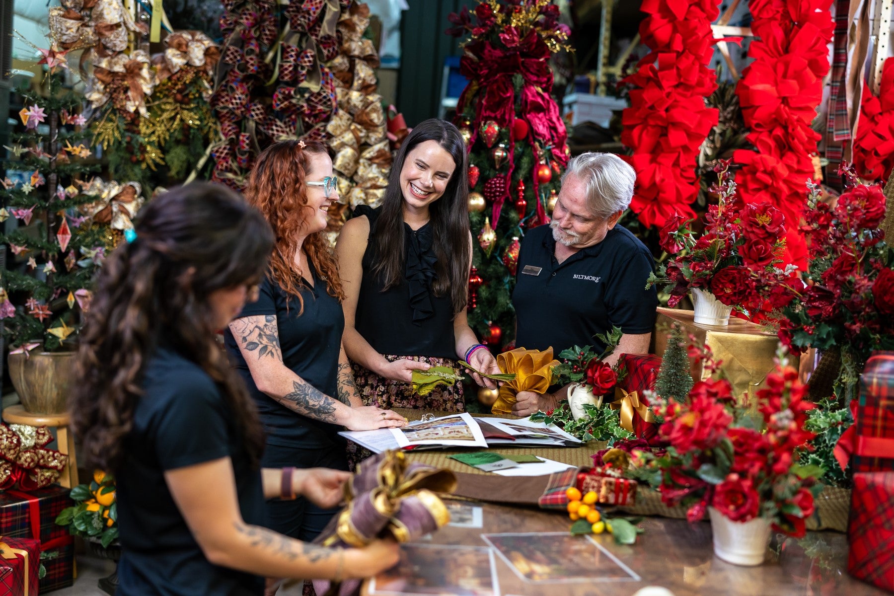 Behind the scenes view of Biltmore Floral Team members planning and preparing this year's Christmas decor.