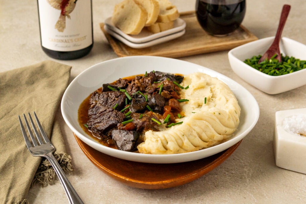 A plate of hearty Beef Bourguignon with Biltmore red wine
