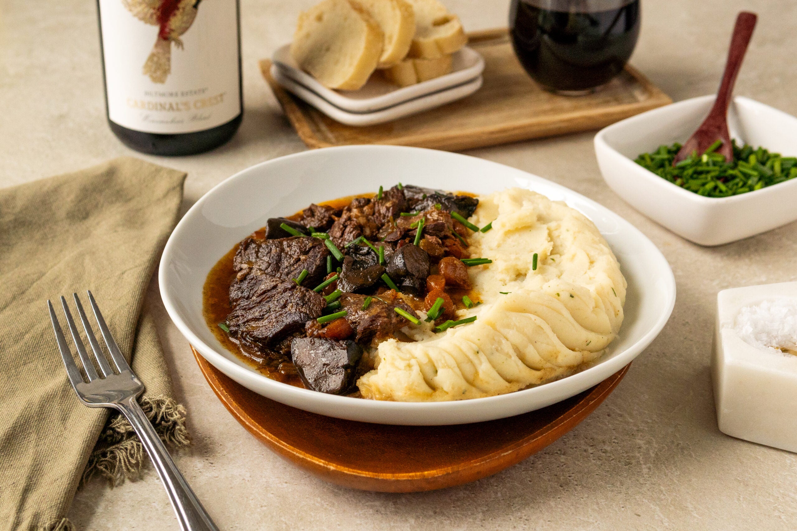 A plate of hearty Beef Bourguignon with Biltmore red wine