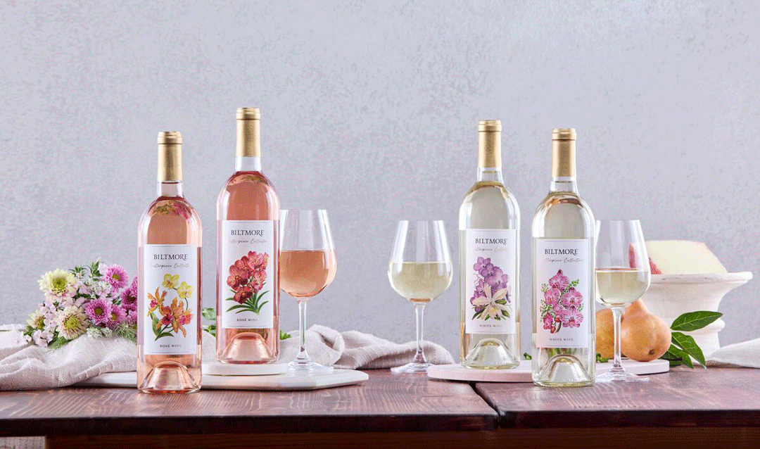 Four bottles of Biltmore Masterpiece Collection wine with orchid labels