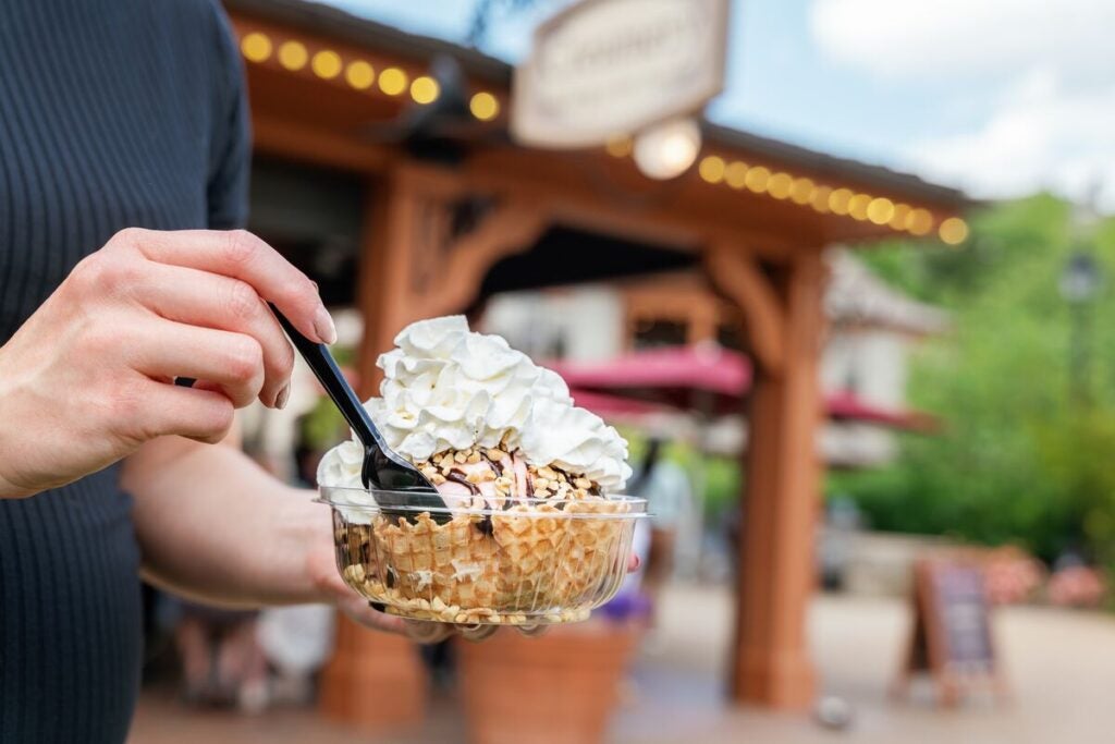 Woman holding a waffle bowl ice cream treat at Biltmore