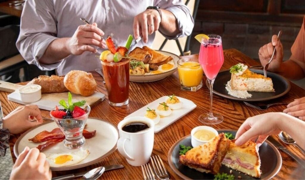 People enjoying a casual food and wine experience, dine at Cedric's Tavern in Antler Hill Village.