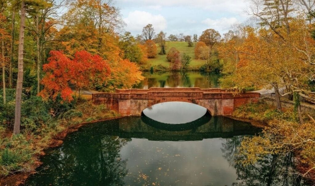 Bass Pond Bridge with fall color at Biltmore