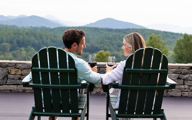 Couple enjoys mountain views from IOBE