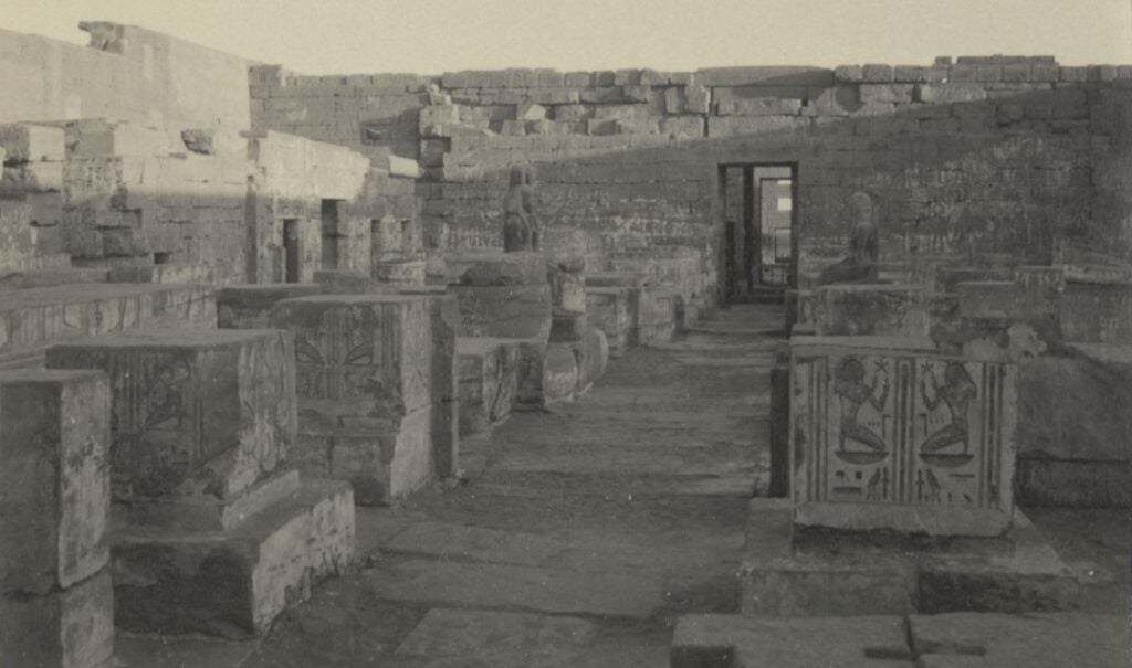 Archival photo of an interior view of the mortuary temple of Ramses III at Medinet Habu, late 1917.