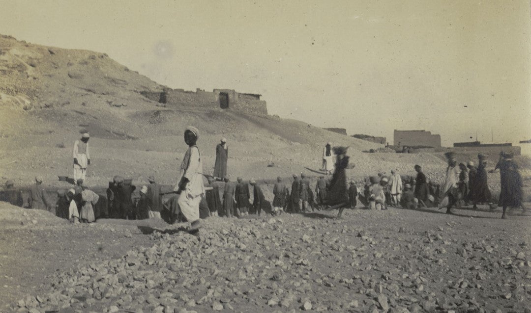 Qurna laborers excavate at Site A in the Valley of the Kings, late 1917, near the spot where the tomb of King Tut would be discovered by Howard Carter in 1922.