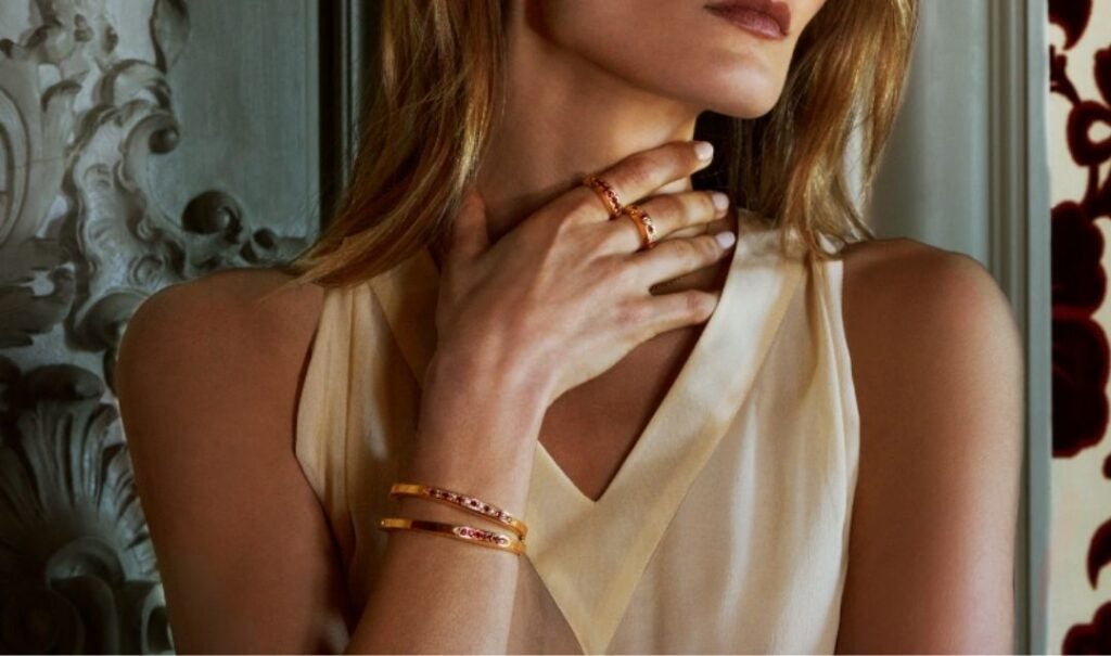 Model wearing pieces from the Stuyvesant Collection by Avermore Jewelry.