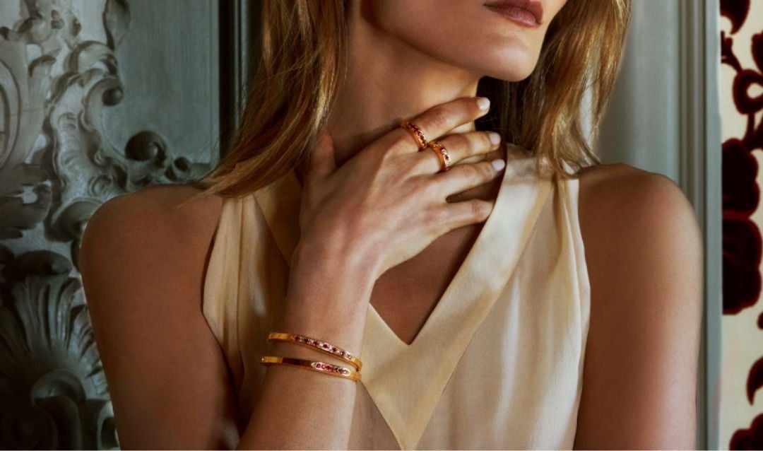 Model wearing pieces from the Stuyvesant Collection by Avermore Jewelry.