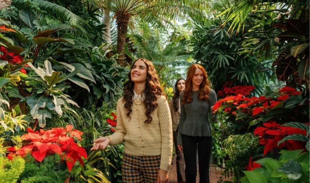 Three young women enjoy the Conservatory at Biltmore