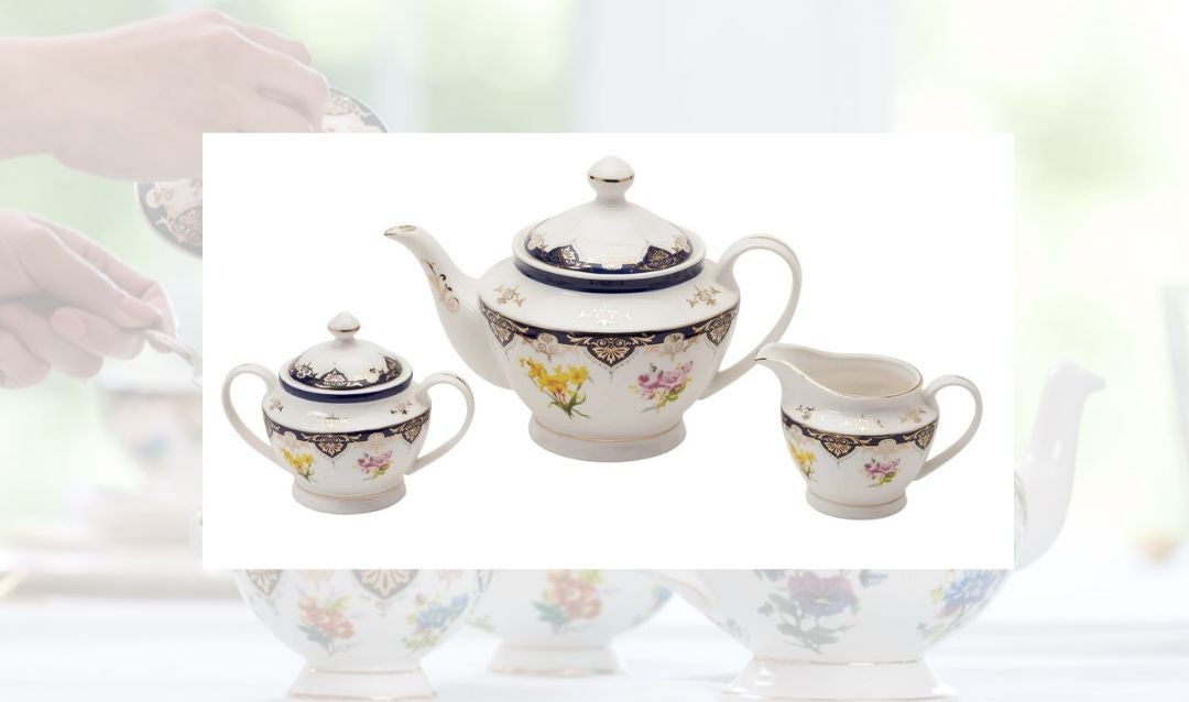 Three-piece tea set in the Vanderbilt-inspired china pattern.