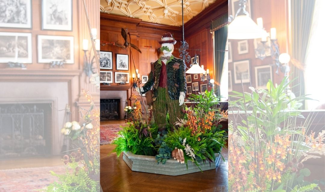 This floral figure represents a gentleman dressed for the outdoors.