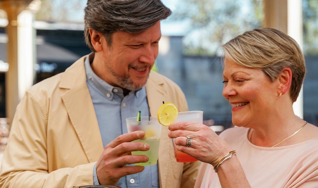 two guests enjoying cocktails