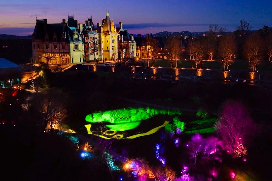 Aerial image of Biltmore House and Gardens at night
