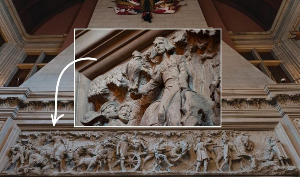 Inset image of a falconer carved above the triple fireplaces in the Banquet Hall of Biltmore House.