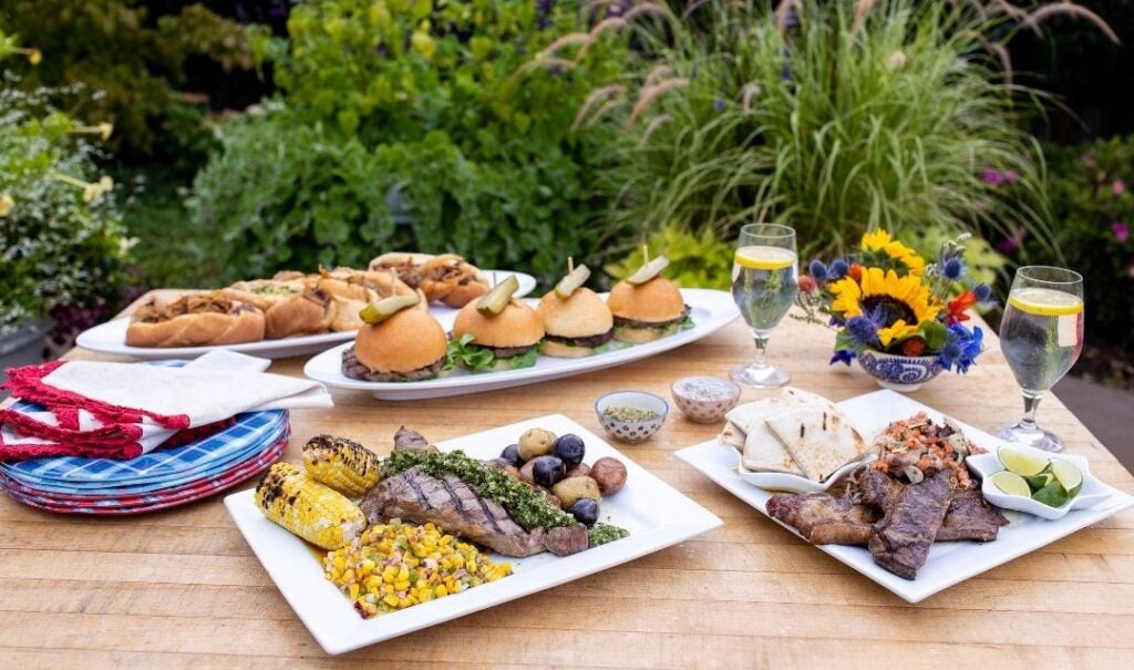 A selection of Biltmore Grown meats on plates.
